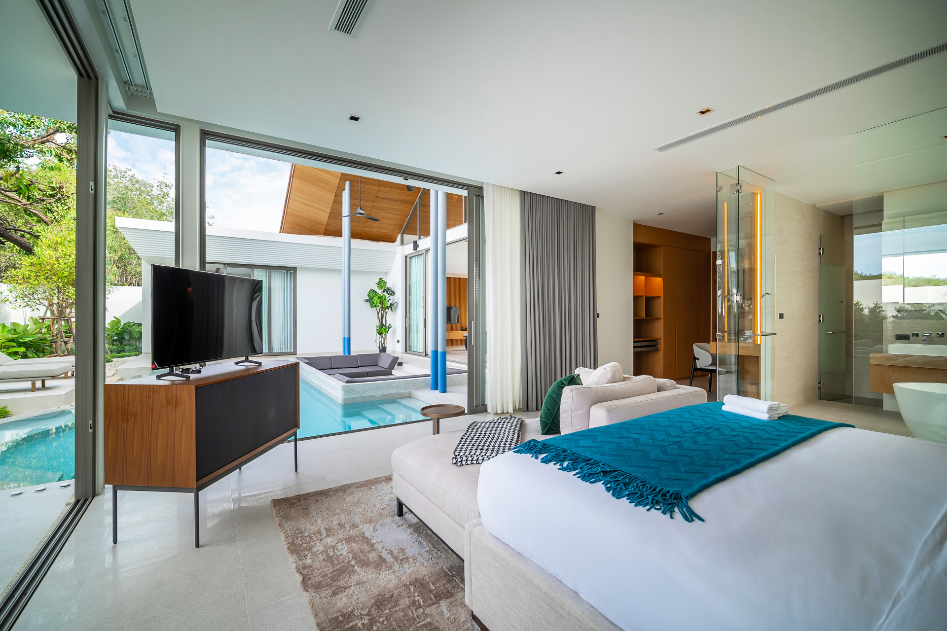 Botanica Louvre — bedroom opening onto the pool terrace