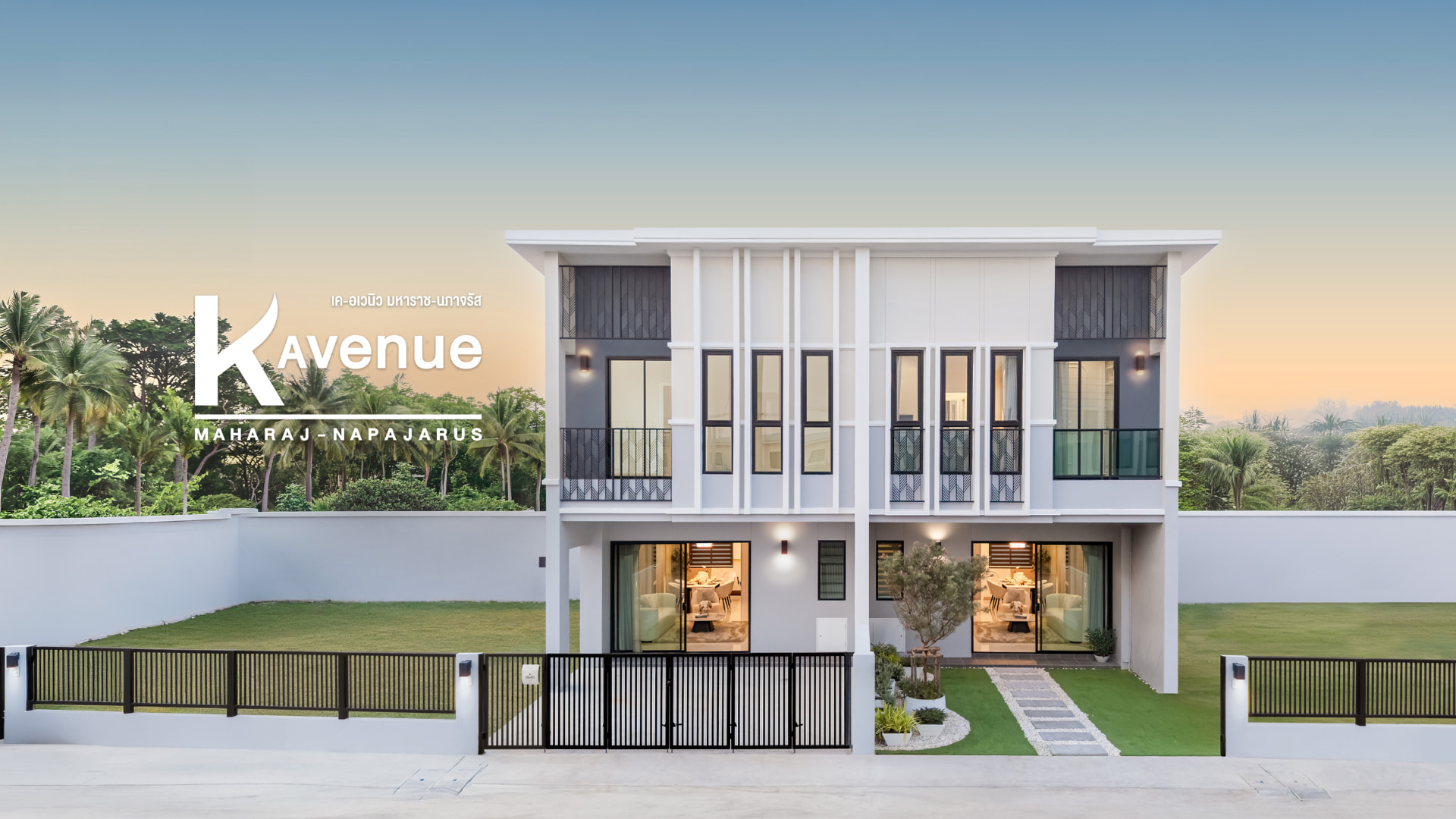 K Avenue II — exterior of a two-storey twin villa at dusk with the K Avenue Maharaj–Napajarus logo