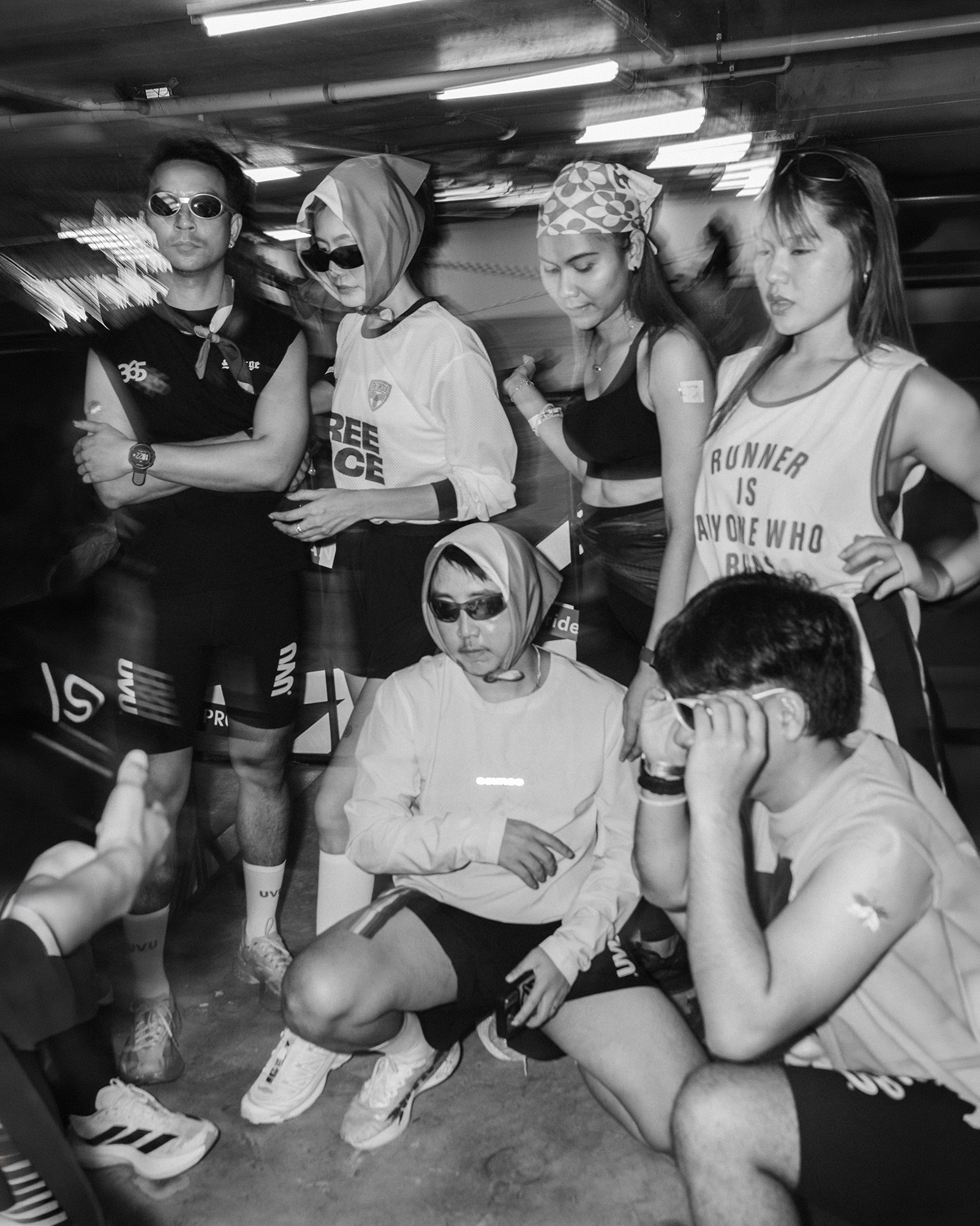 Central Phuket Beyond Move — runners posing together before the run, black and white
