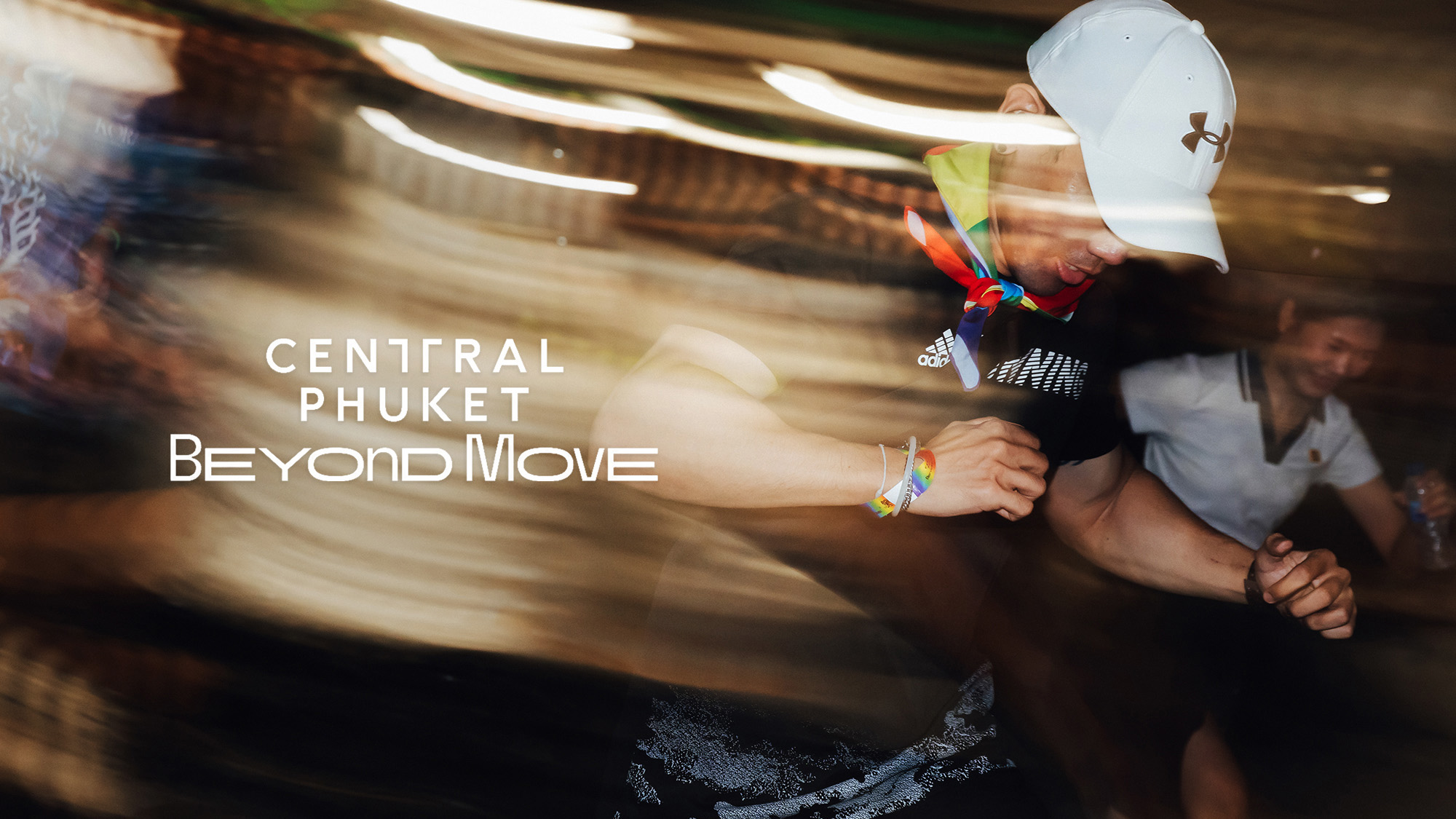 Central Phuket Beyond Move — runner charging through motion-blurred light trails, the Central Phuket Beyond Move logo across the frame