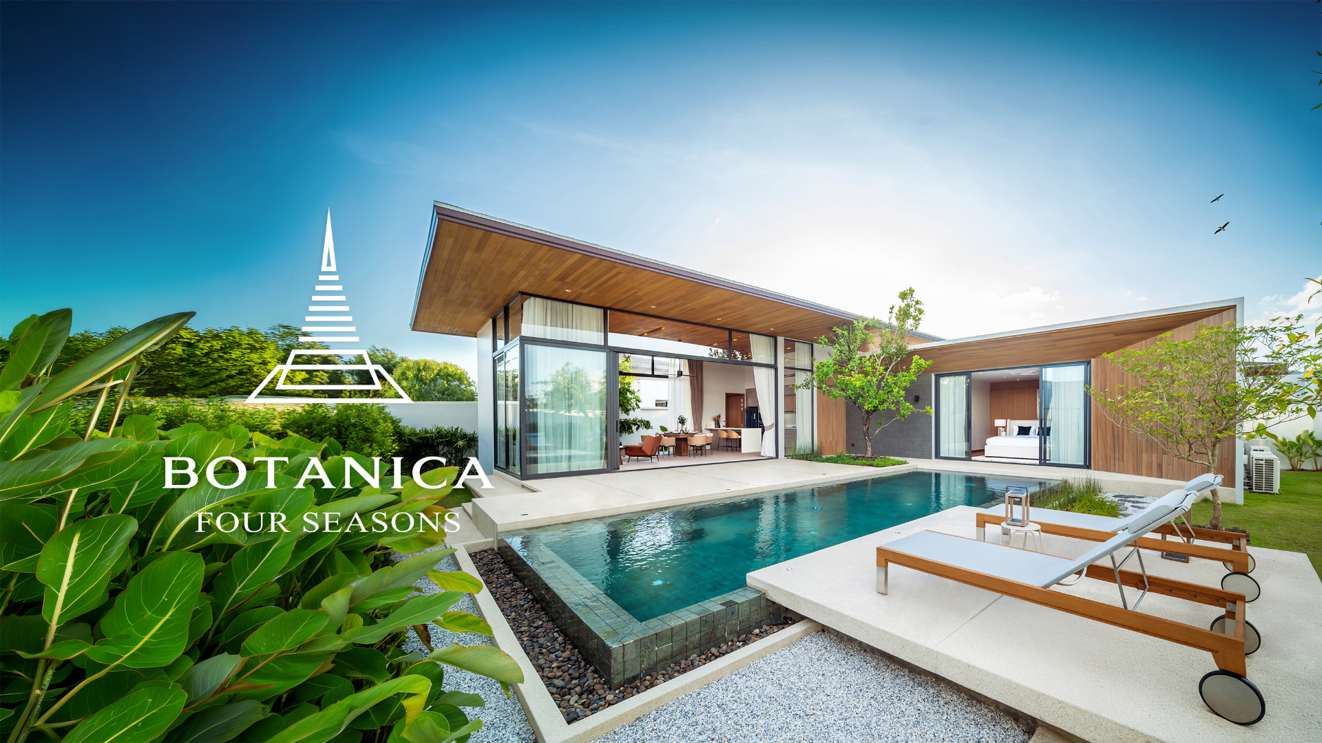 Botanica Four Seasons — exterior view across the pool to the open living area and bedroom wing